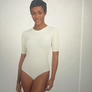 Spanx body suit in parchment